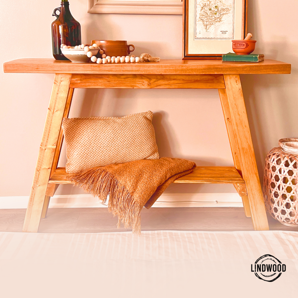 Console table made from pine timber, showcasing elegant interior design with vintage decor.
